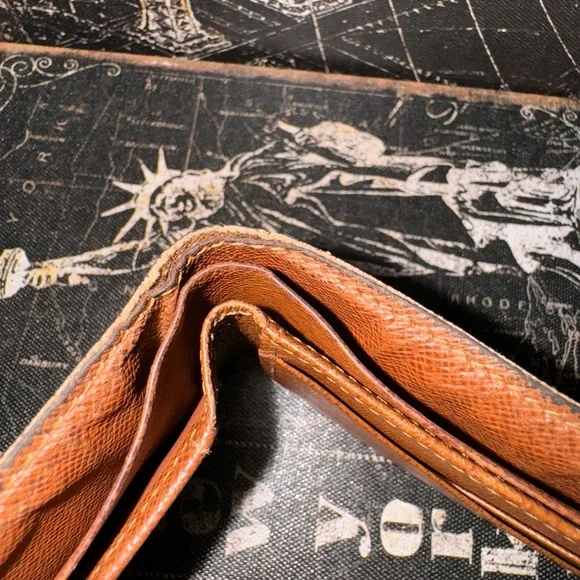 Louis Vuitton men’s multiple monogram wallet.